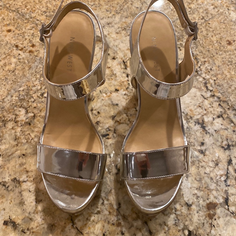 Nine West high heeled Silver sandals.